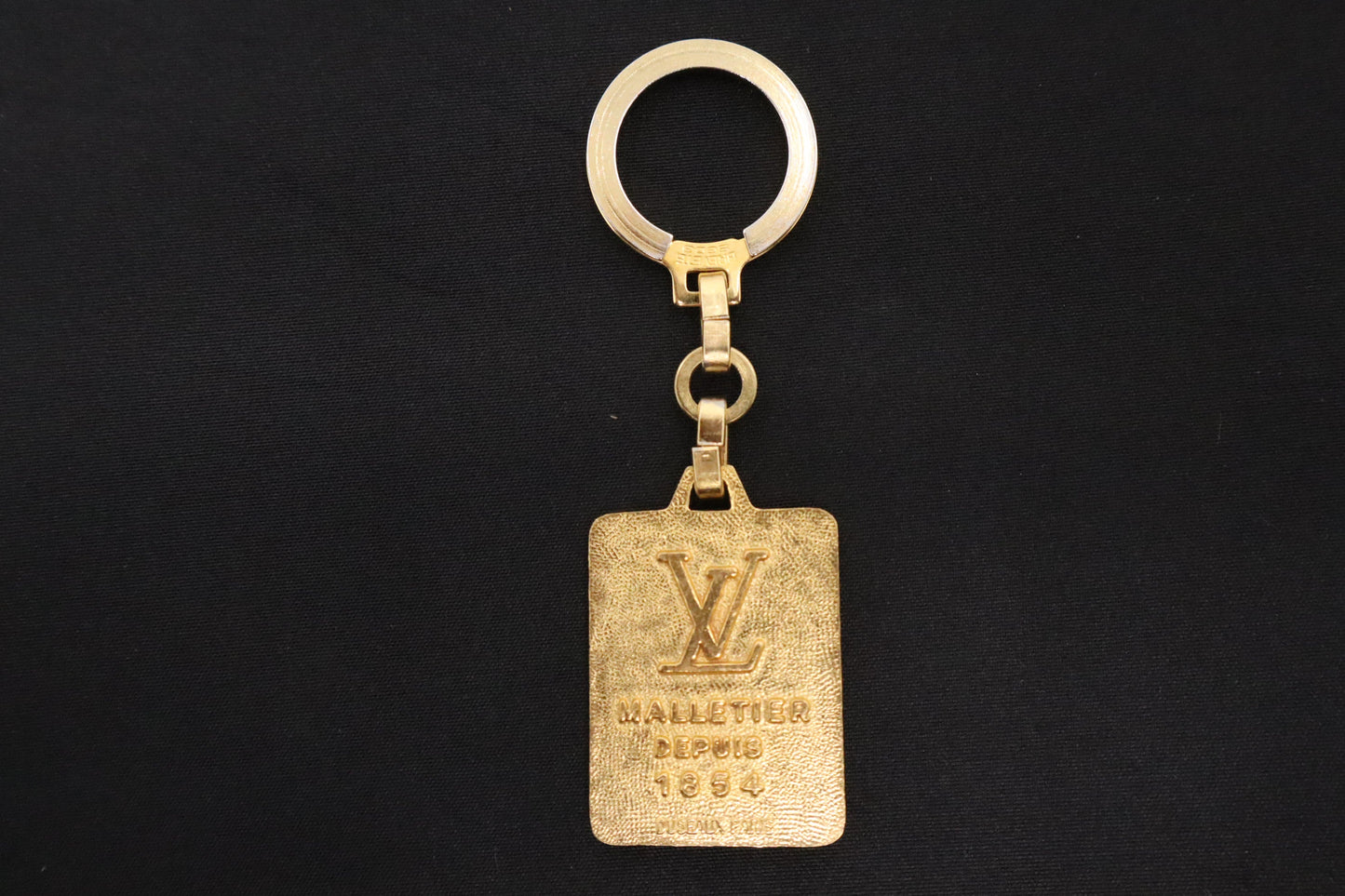 Louis Vuitton "Volez, Voguez, Voyagez" Key Ring