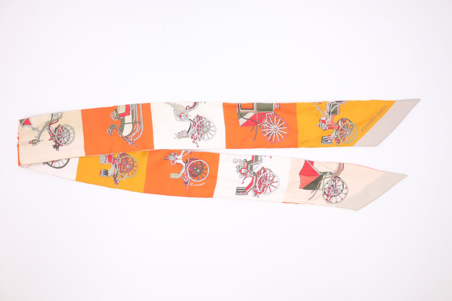 Hermes "Les Voitures Exquises" Twilly in Orange & Cream Silk
