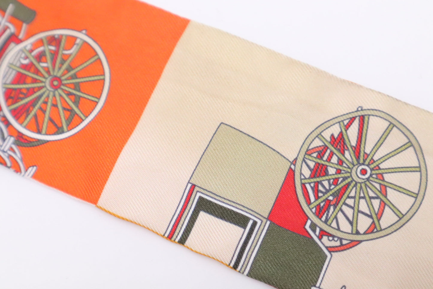 Hermes "Les Voitures Exquises" Twilly in Orange & Cream Silk