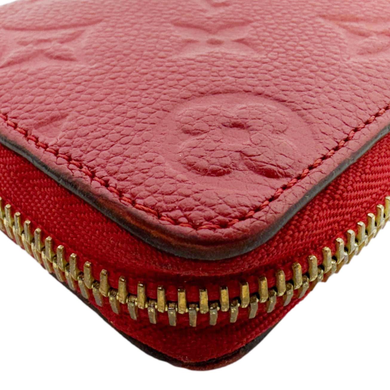 LOUIS VUITTON Clemence Monogram Empreinte Leather Wallet Red