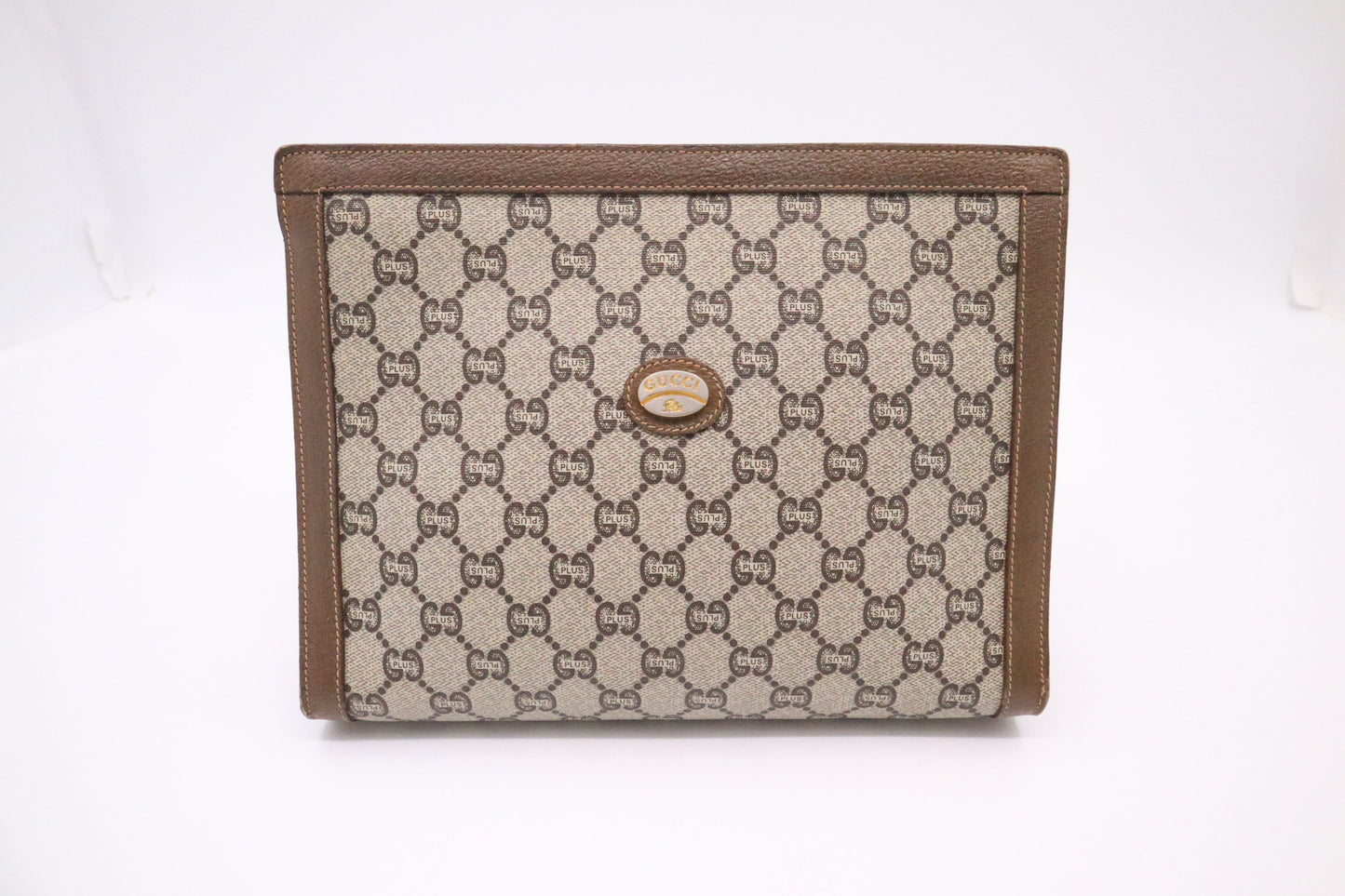 Gucci Plus Clutch in GG Supreme Canvas