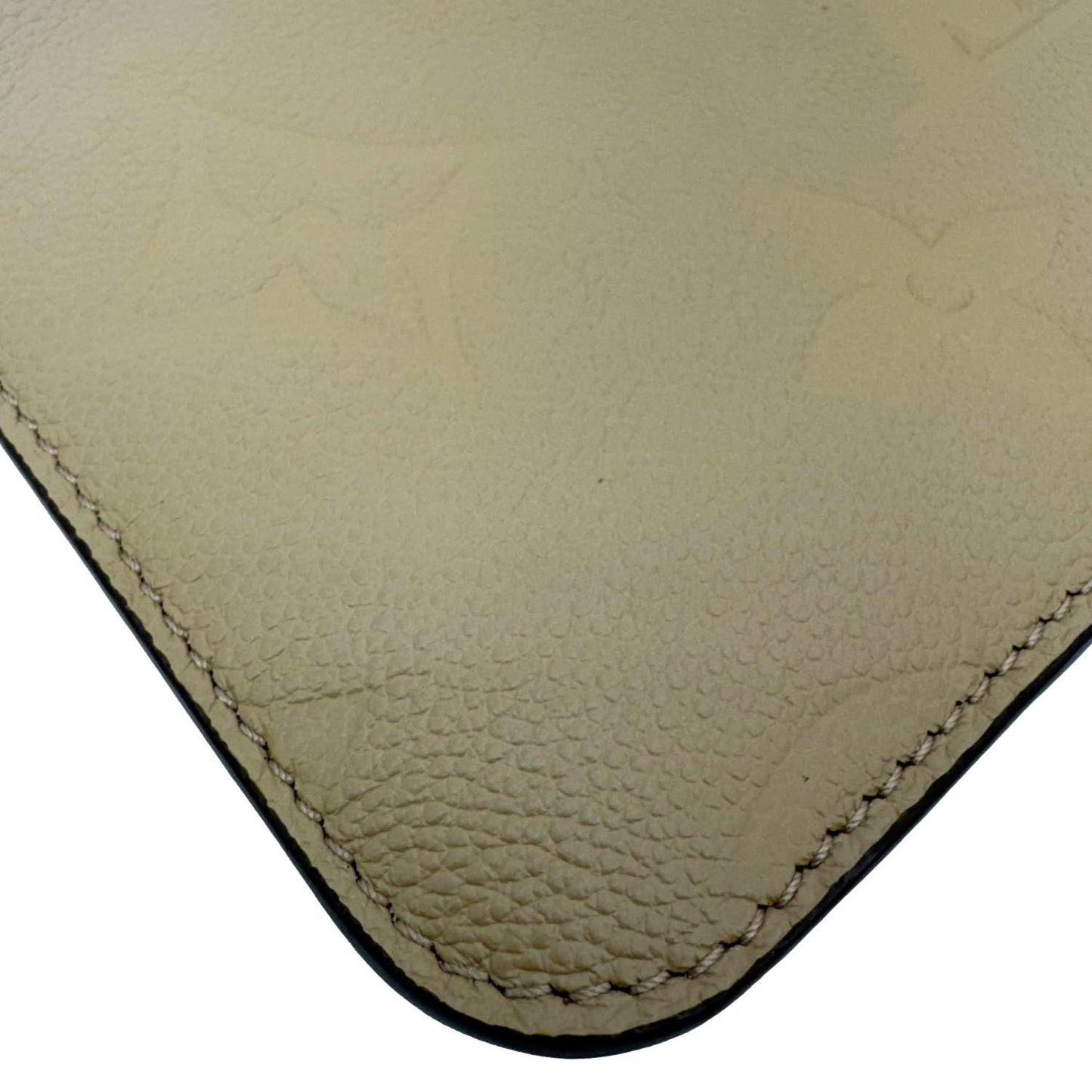 LOUIS VUITTON Empreinte Monogram Leather Wristlet Beige