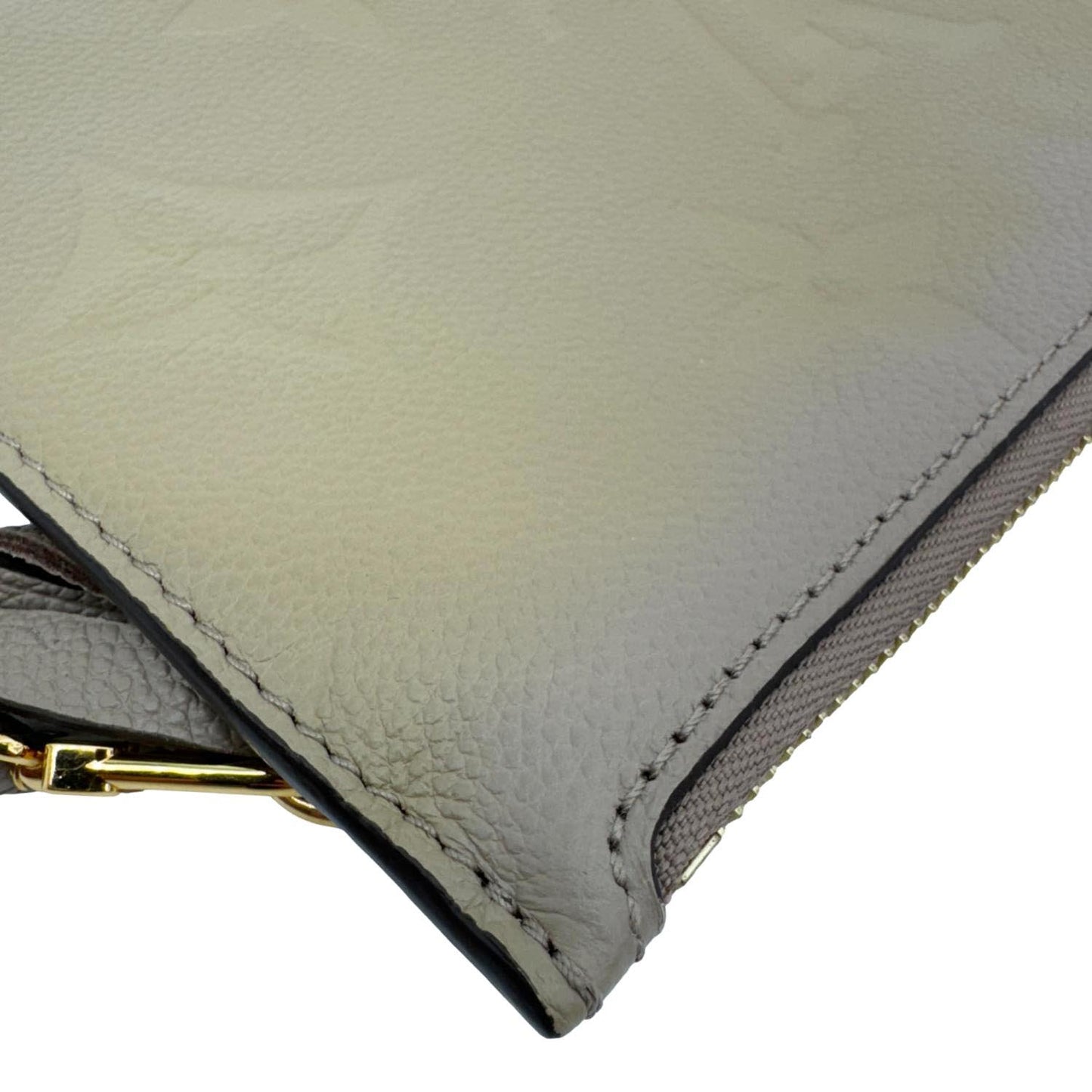 LOUIS VUITTON Empreinte Monogram Leather Wristlet Beige