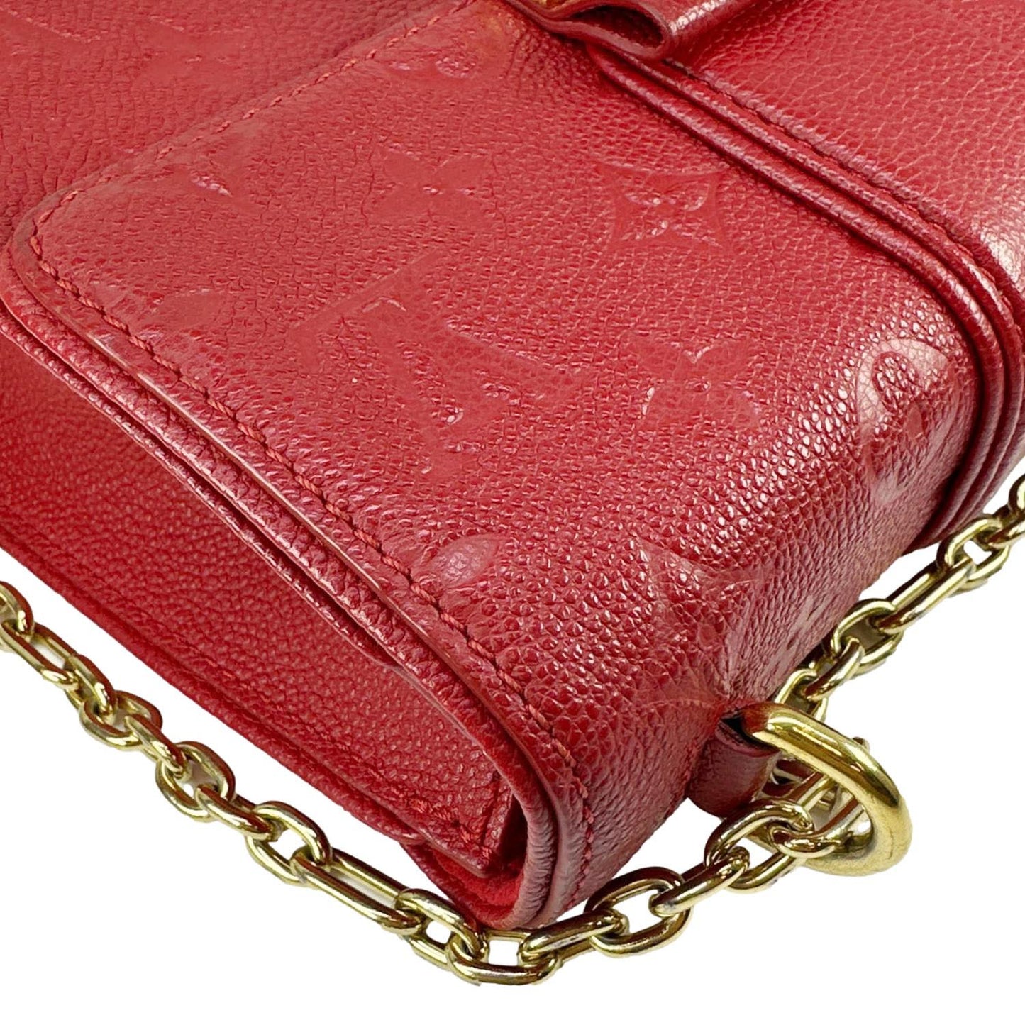 LOUIS VUITTONSaint Sulpice BB Monogram Empreinte Leather Shoulder Bag Red