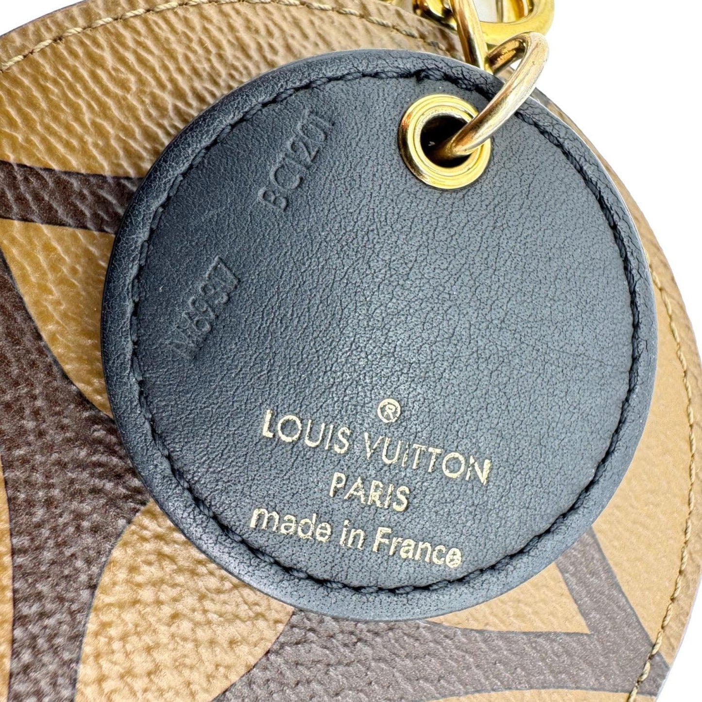 LOUIS VUITTON Reverse Monogram Canvas Round Charm Key Holder Brown