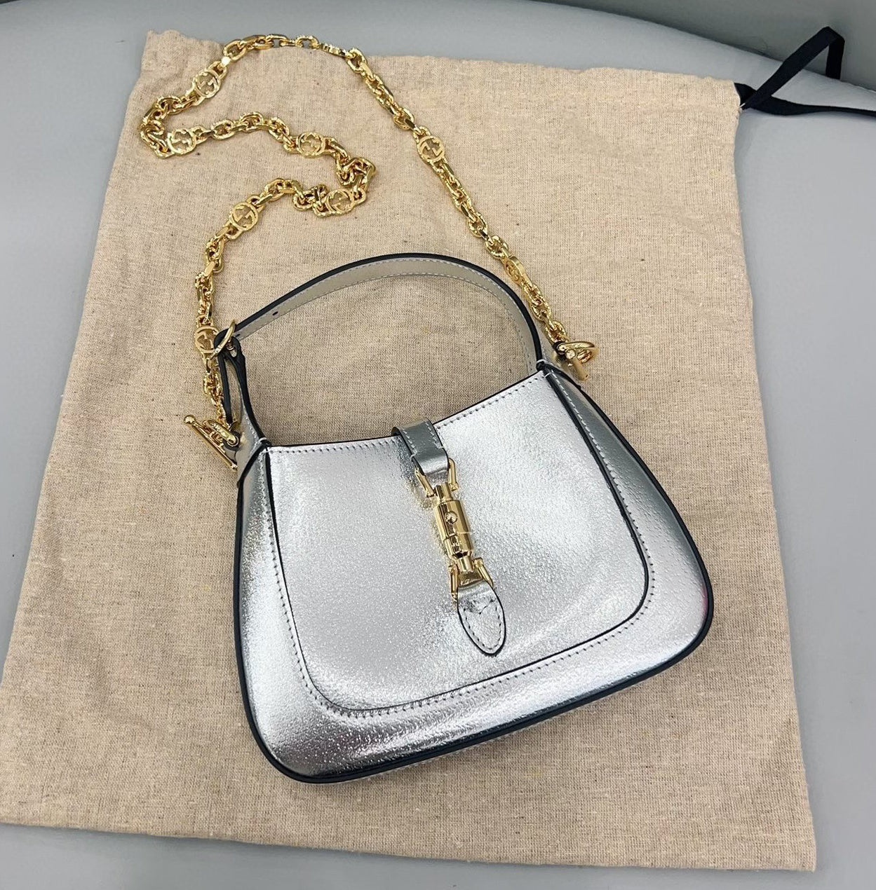 Gucci Jackie 1961 Mini Silver LamÃ© Leather Bag with Chain Strap