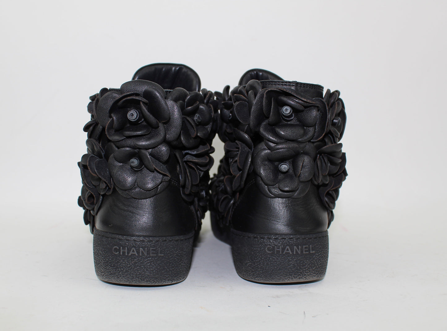 CHANEL CALFSKIN CAMELLIA HIGH TOP SNEAKERS