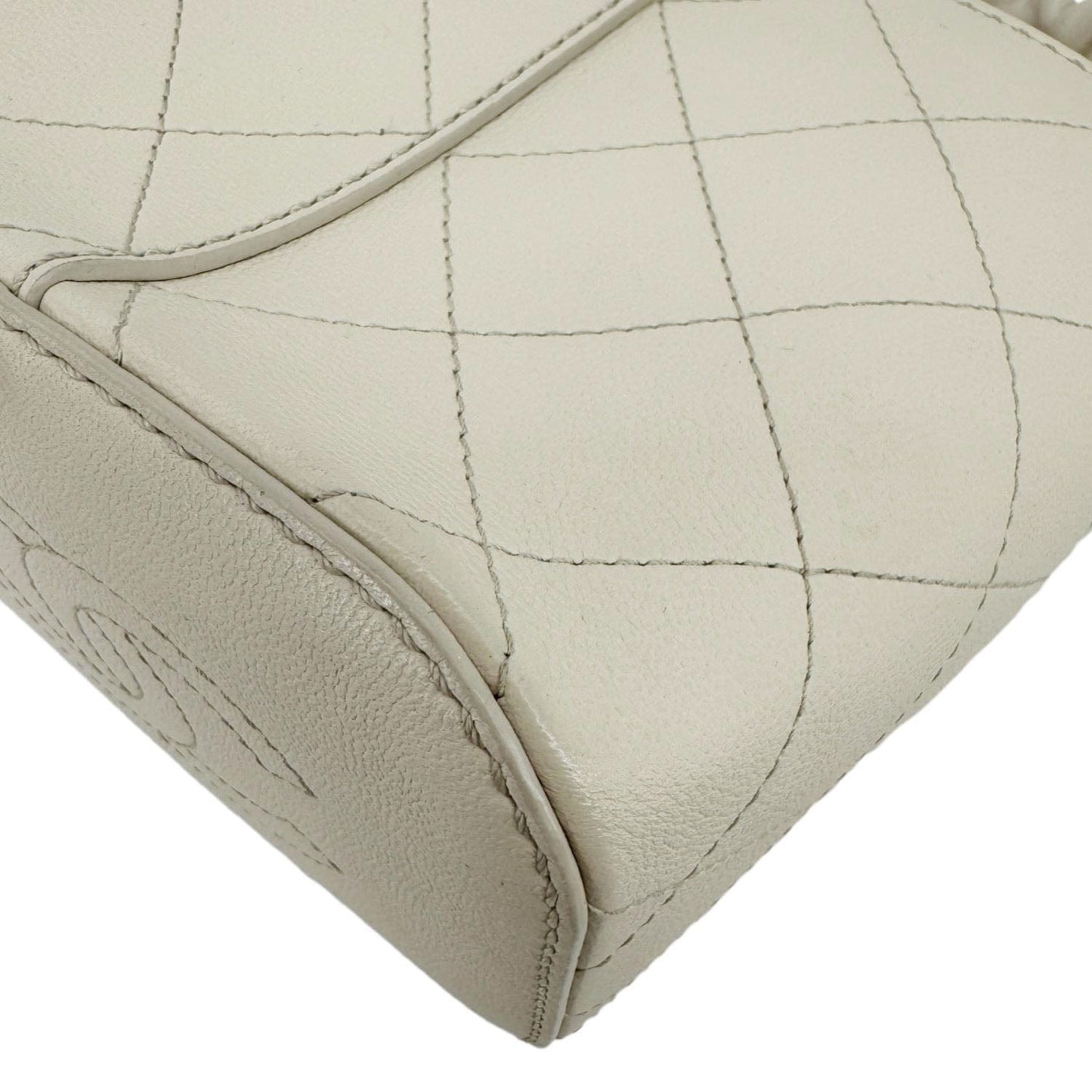 CHANEL CC Drawstring Quilted Leather Crossbody Bucket Bag Cream