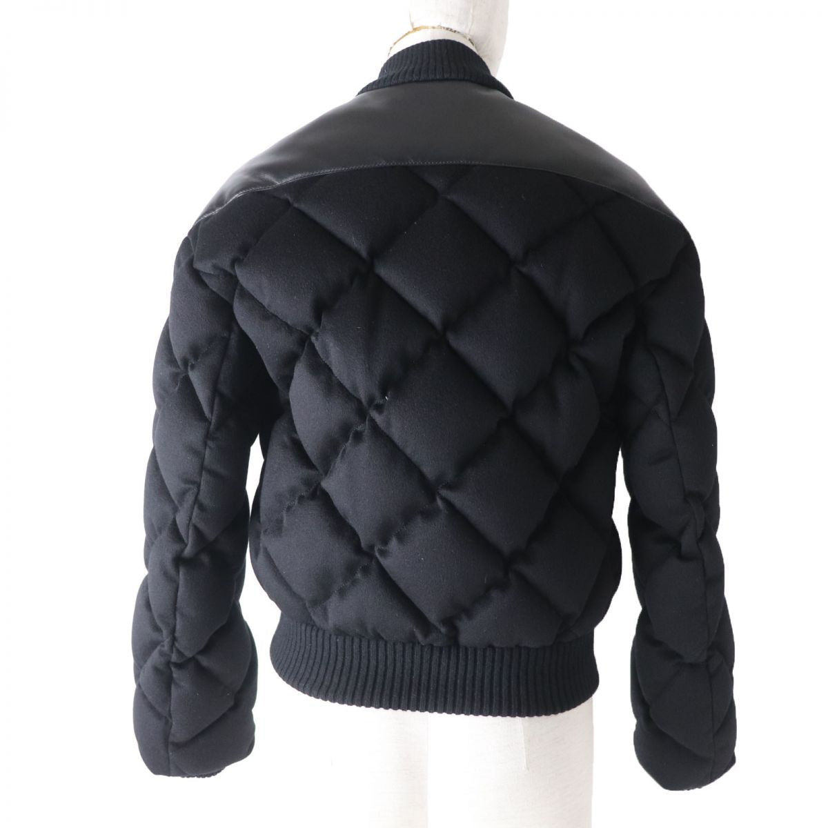 HERMES Down jacket Main: 100% cashmere, Part: Sheepskin, Part: Leather, Filling: 90% down, Filling: 10% feather, Rib part: 90% cashmere, 9% nylon, 1% polyurethane, Part: 100% polyester black Women 34