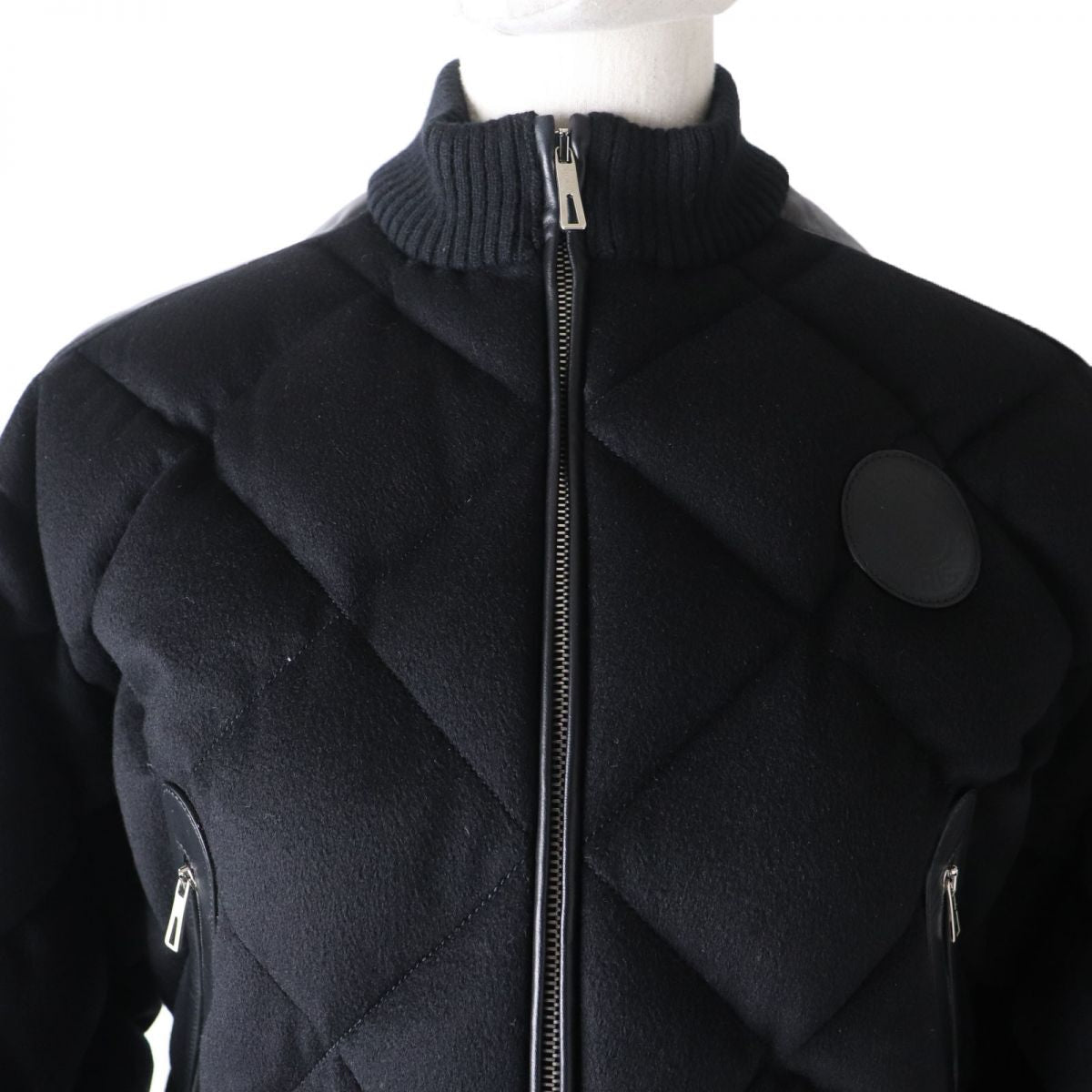 HERMES Down jacket Main: 100% cashmere, Part: Sheepskin, Part: Leather, Filling: 90% down, Filling: 10% feather, Rib part: 90% cashmere, 9% nylon, 1% polyurethane, Part: 100% polyester black Women 34
