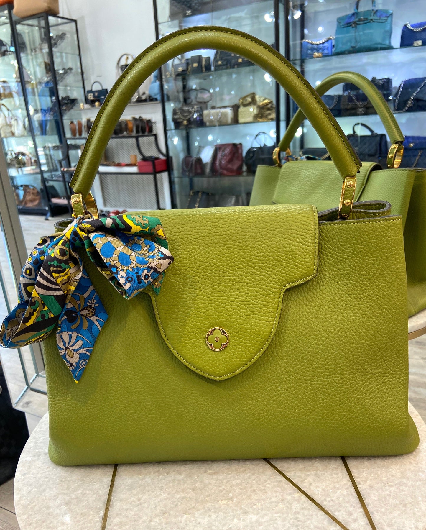 LOUIS VUITTON CAPUCINES MM LEATHER PARNASSÃA HANDBAG