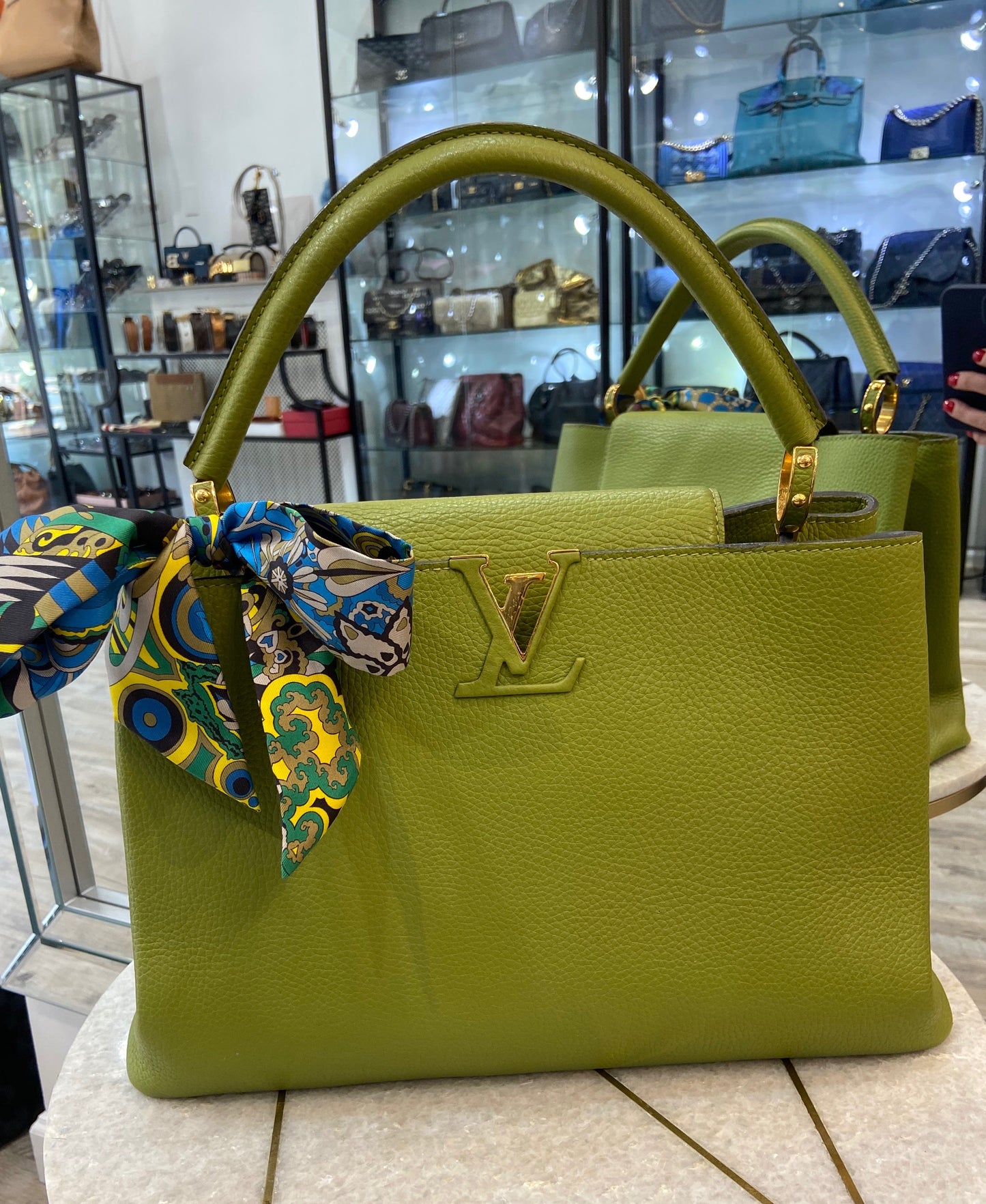 LOUIS VUITTON CAPUCINES MM LEATHER PARNASSÃA HANDBAG