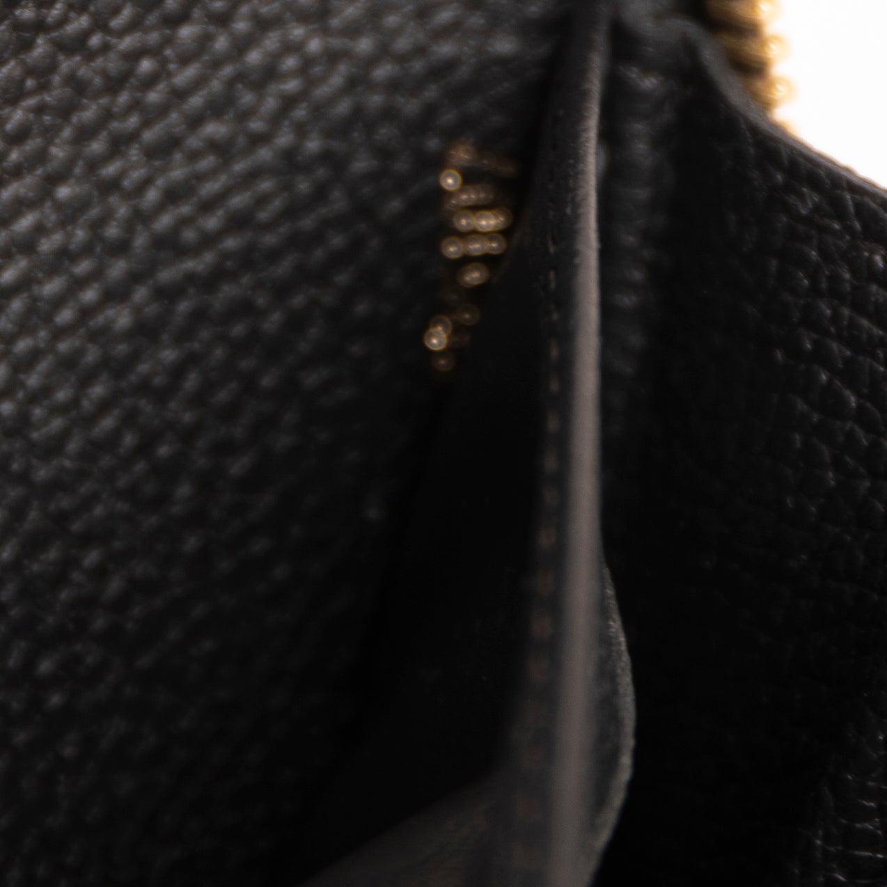 Louis Vuitton Monogram Empreinte Leather Zippy Wallet