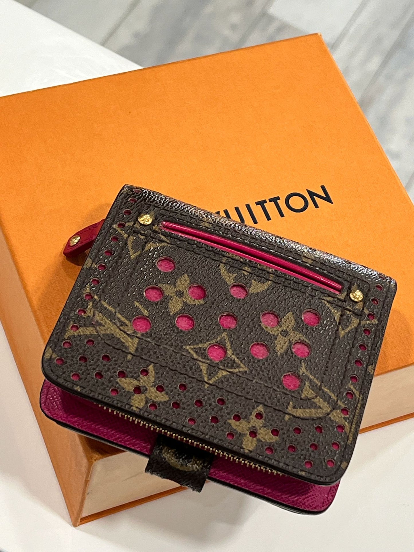 LOUIS VUITTON MONOGRAM PERFORATED COMPACT WALLET