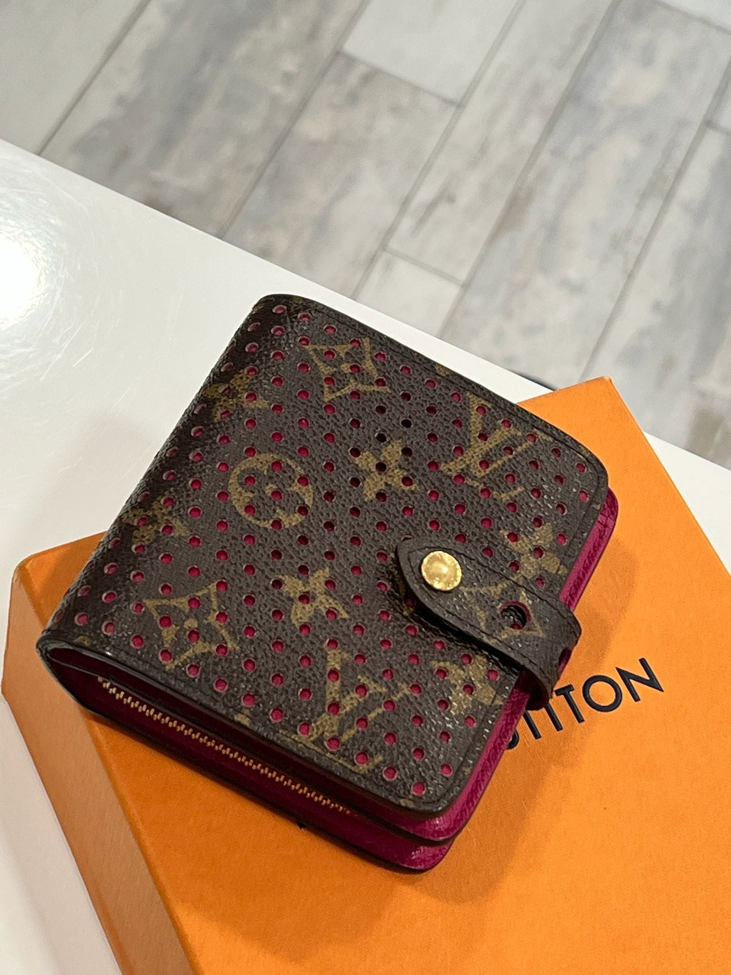LOUIS VUITTON MONOGRAM PERFORATED COMPACT WALLET