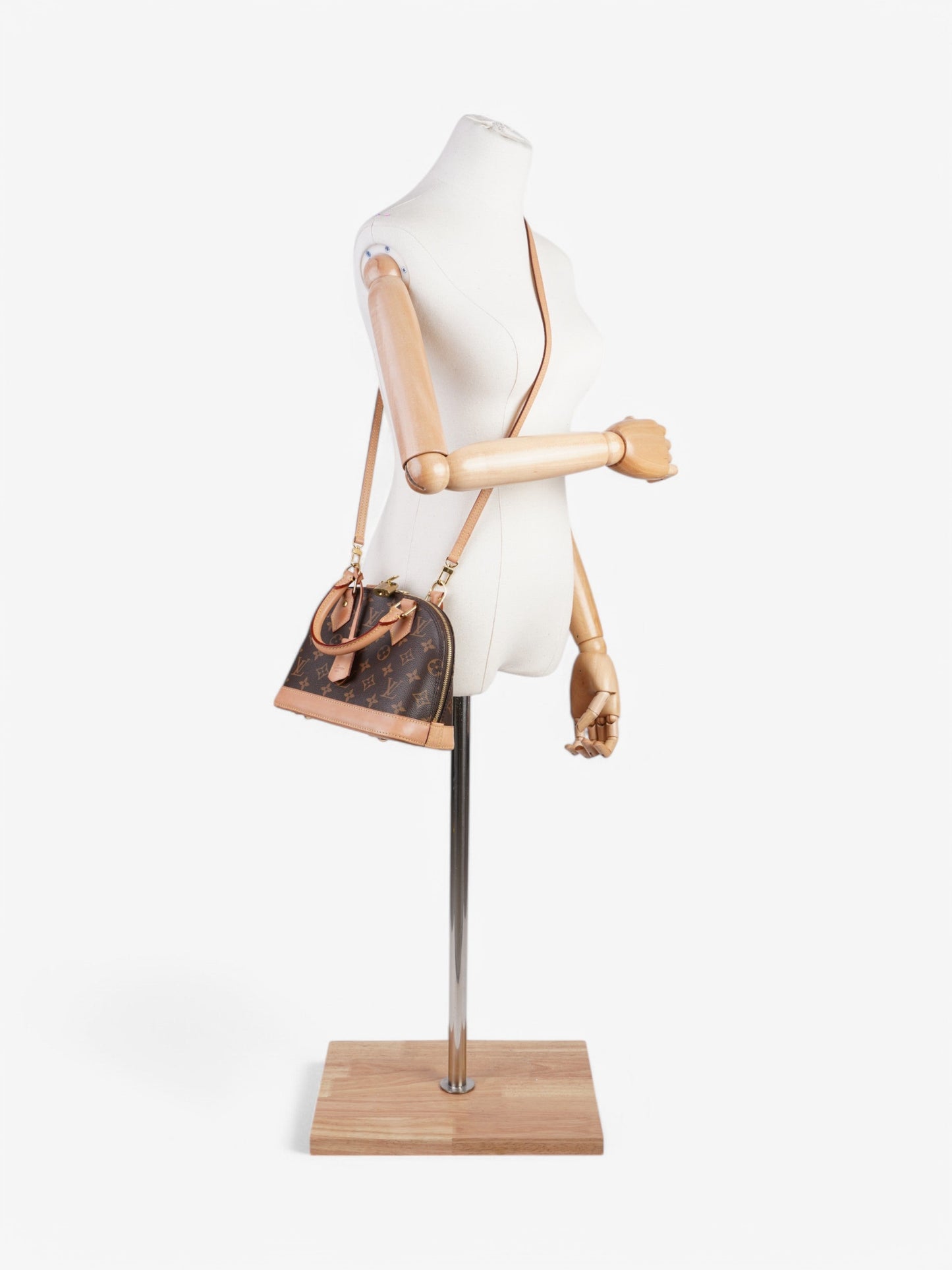 Louis Vuitton Alma Monogram Coated Canvas BB