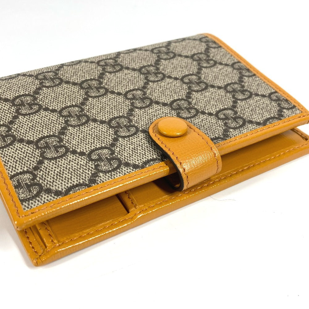 GUCCI passport case 724562 GG Supreme canvas, leather yellow GG Supreme RETRO logo