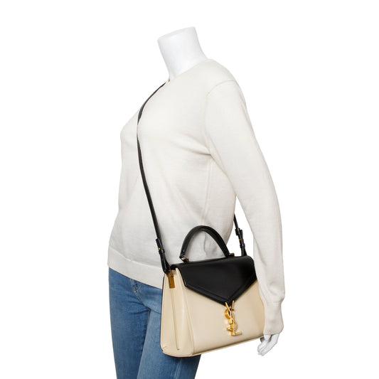 Saint Laurent 2023 Black & Ivory Smooth Leather Cassandra Medium Top Handle Bag