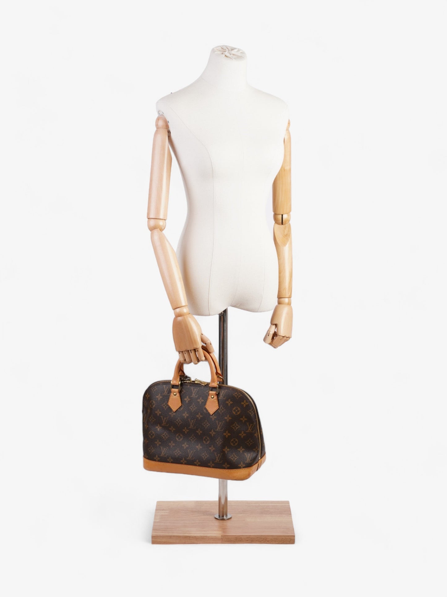 Louis Vuitton Alma Monogram Coated Canvas PM