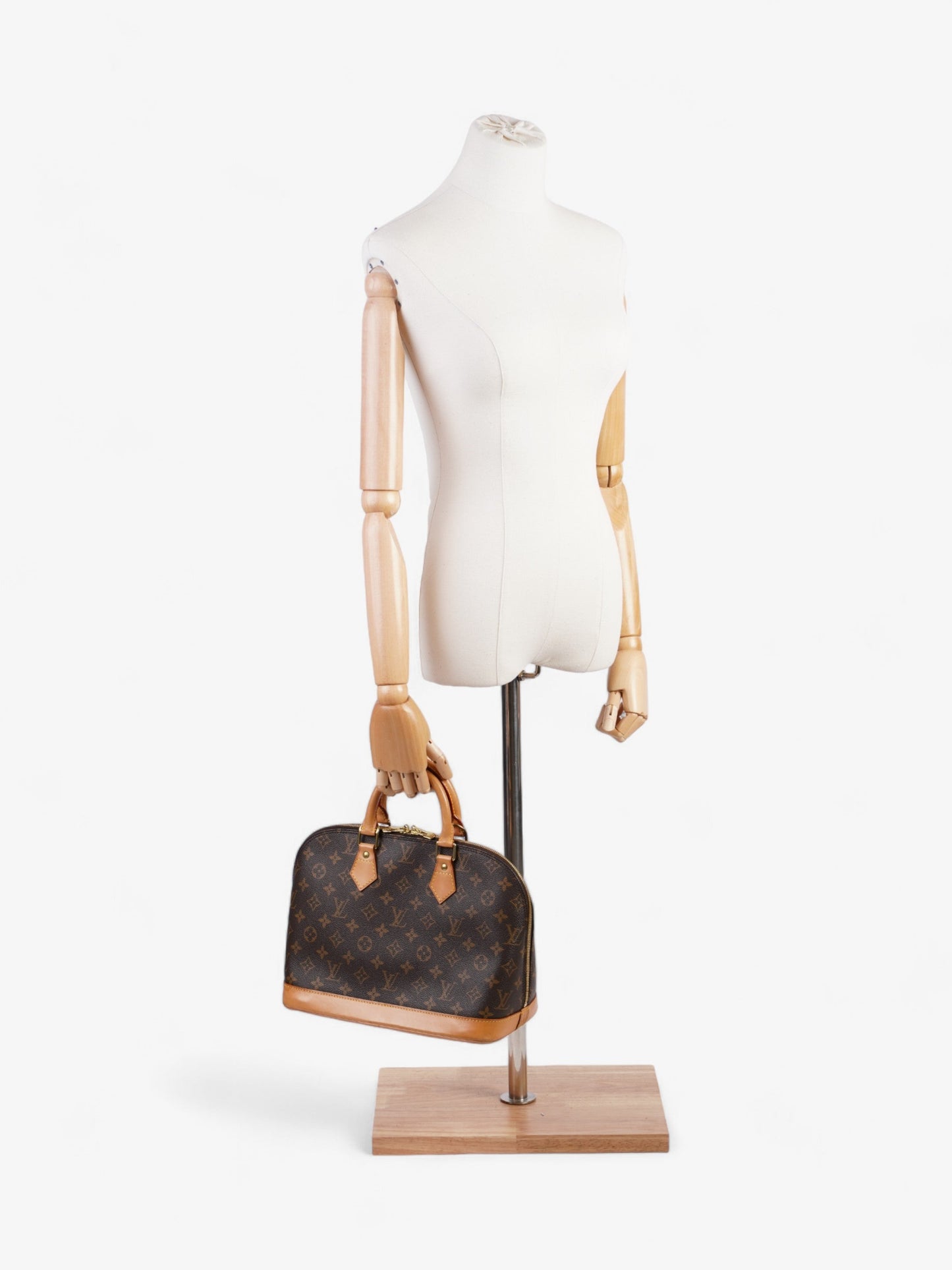 Louis Vuitton Alma Monogram Coated Canvas PM
