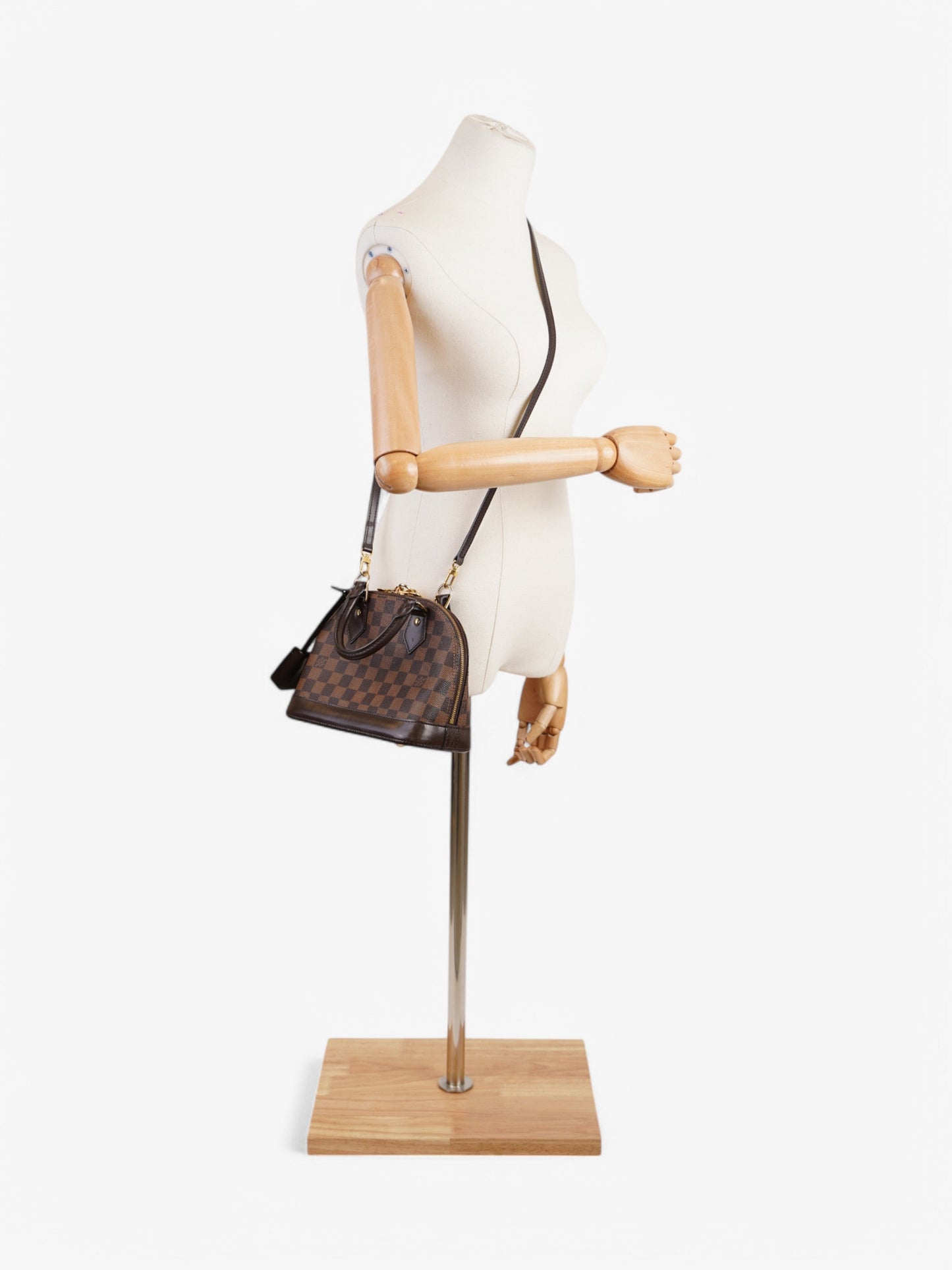 Louis Vuitton Alma Monogram Coated Canvas BB
