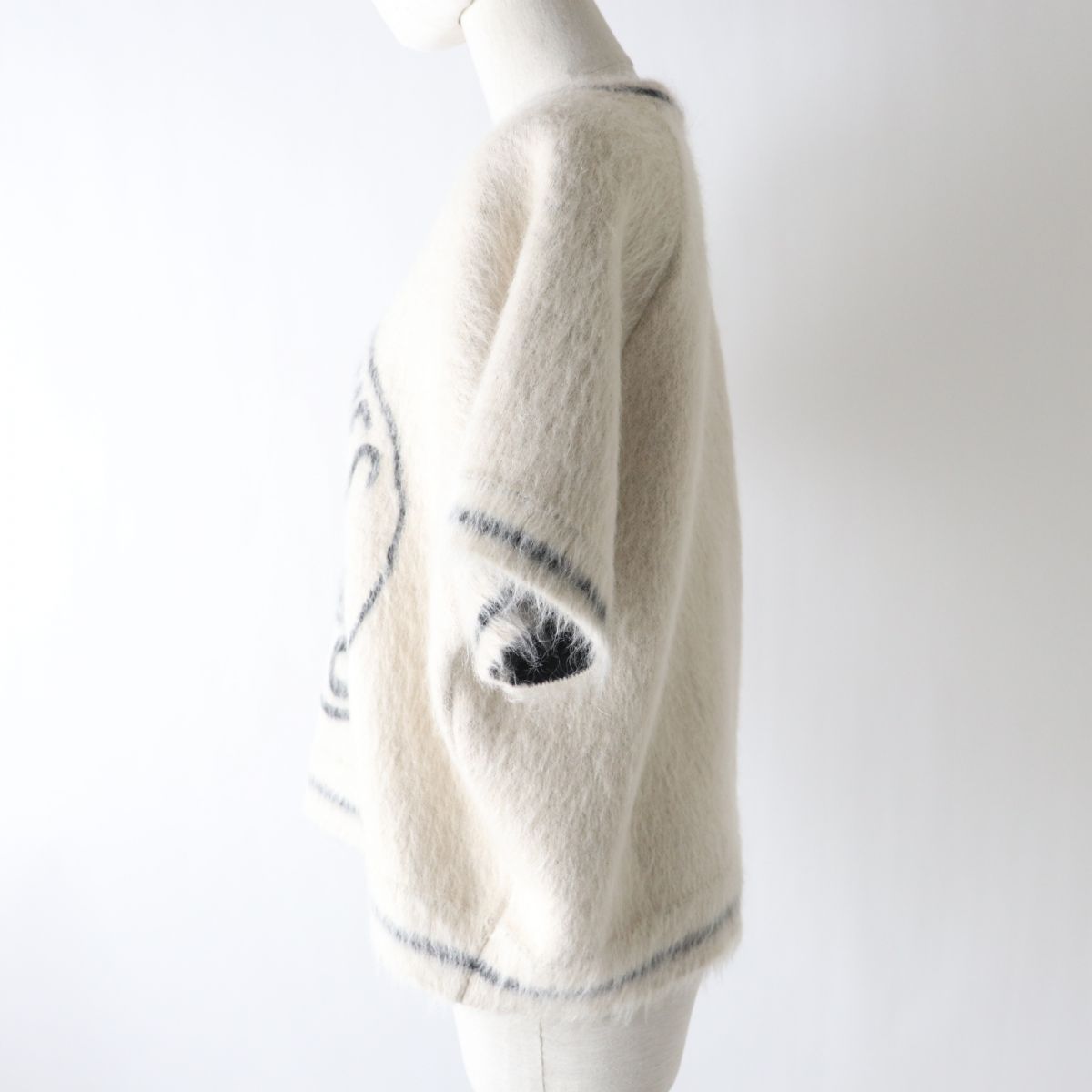 Christian Dior knit Main: 34% mohair, Main: 31% virgin wool, Main: 18% nylon, Main: 13% cashmere, Main: 3% wool Ivoryx black Women 44