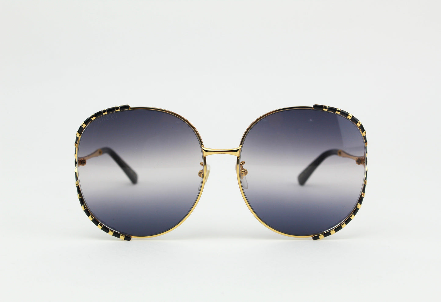 Gucci black and gold sunglasses