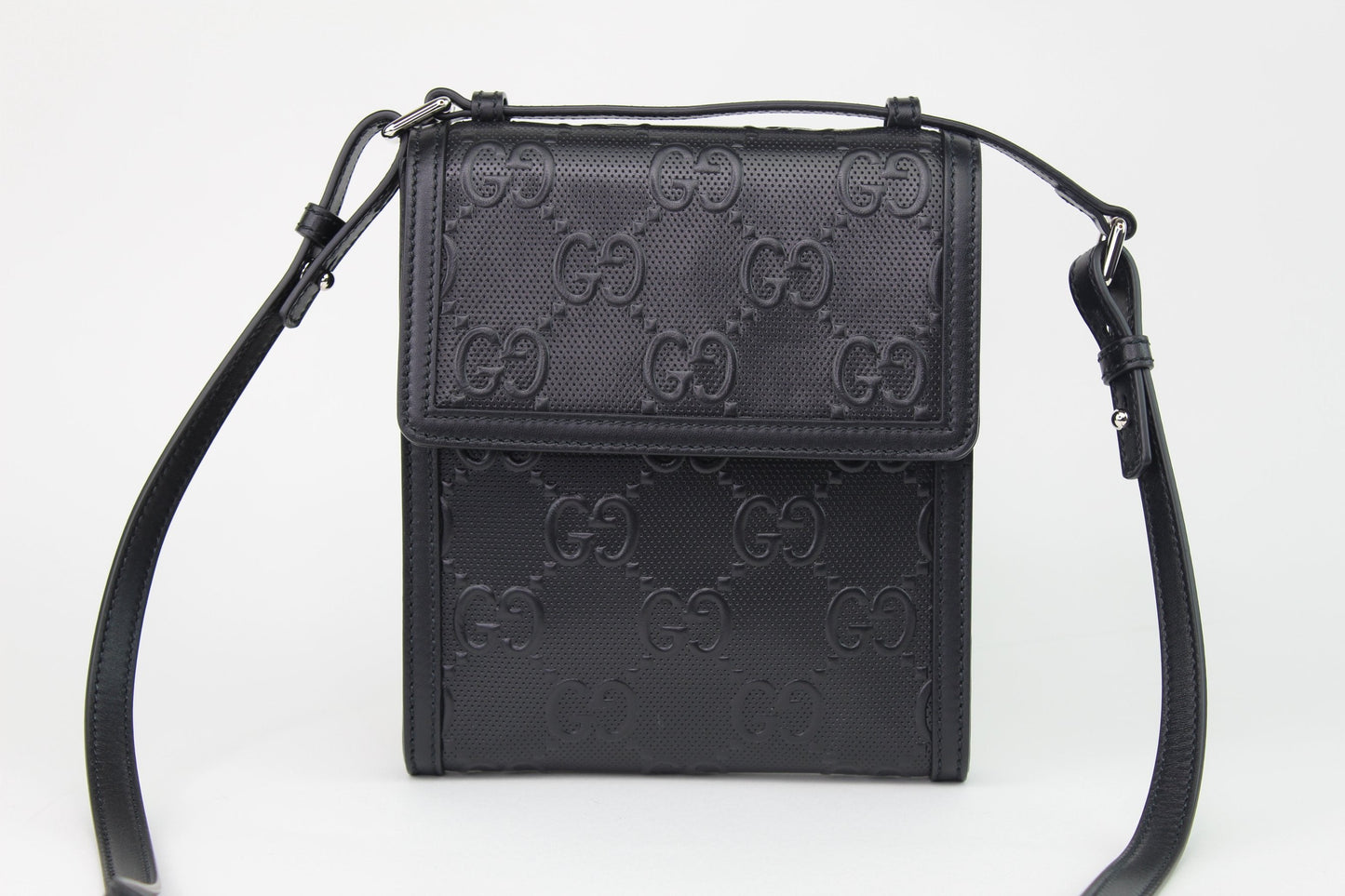 Gucci GG Embossed Messenger Bag