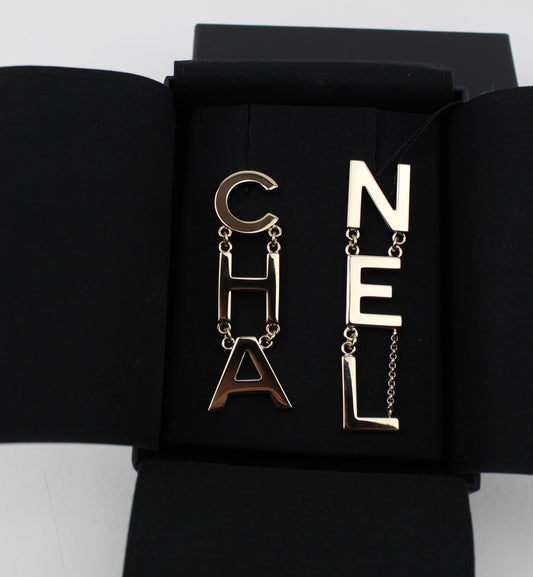 CHANEL METAL CHA-NEL LOGO DROP EARRINGS