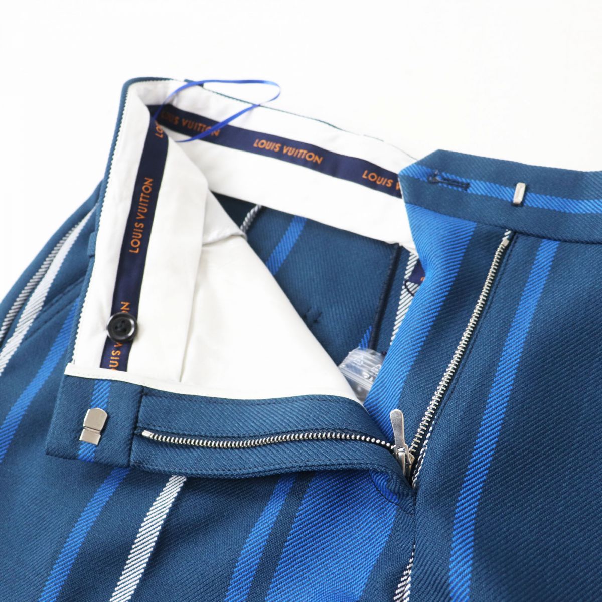 LOUIS VUITTON Pants Outer: 100% polyester, Lining: 60% rayon, Lining: 35% cupra, Lining: 5% polyurethane Blue type Stripe Pattern Women 38